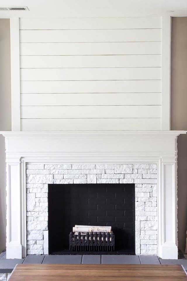 tongue and groove paneled fireplace