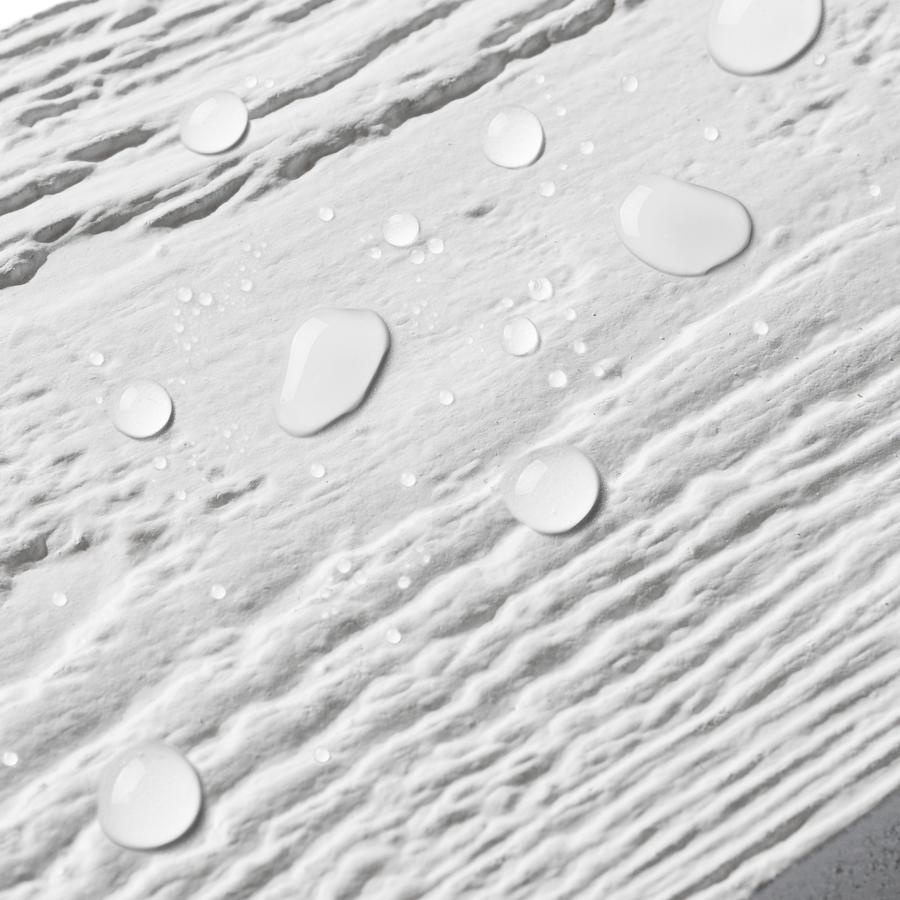 Exterior trim board with beads of water by CoreVantage