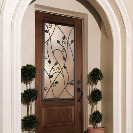 dark brown maisonite door with glass panel with floral rods belleville