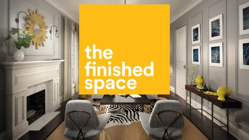 A living room with green wallpaper and white trim. An orange box with the text "The Finished Space" is overlaid over top.