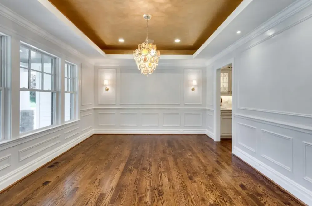 For Blog Only - Classic Cottages - Hardwood Floor Empty Room with Paneling