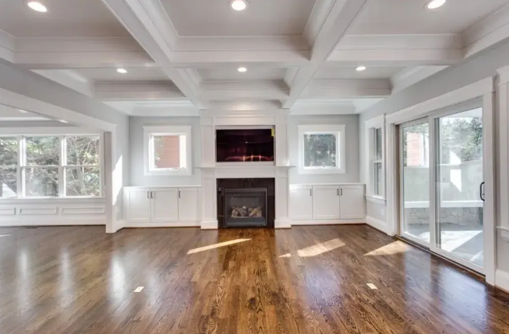 For Blog Only - Classic Cottages LLC - Empty Open Coffered Ceiling Living Room